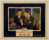 STRANGERS ON A TRAIN