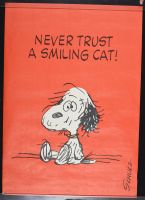 Snoopy- Never Trust a Smiling Cat